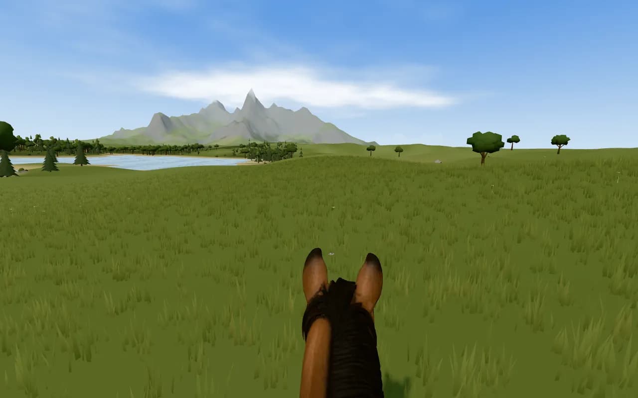 View from the saddle in the virtual ride: a horse's ears above a meadow, with a lake, forest and mountains ahead